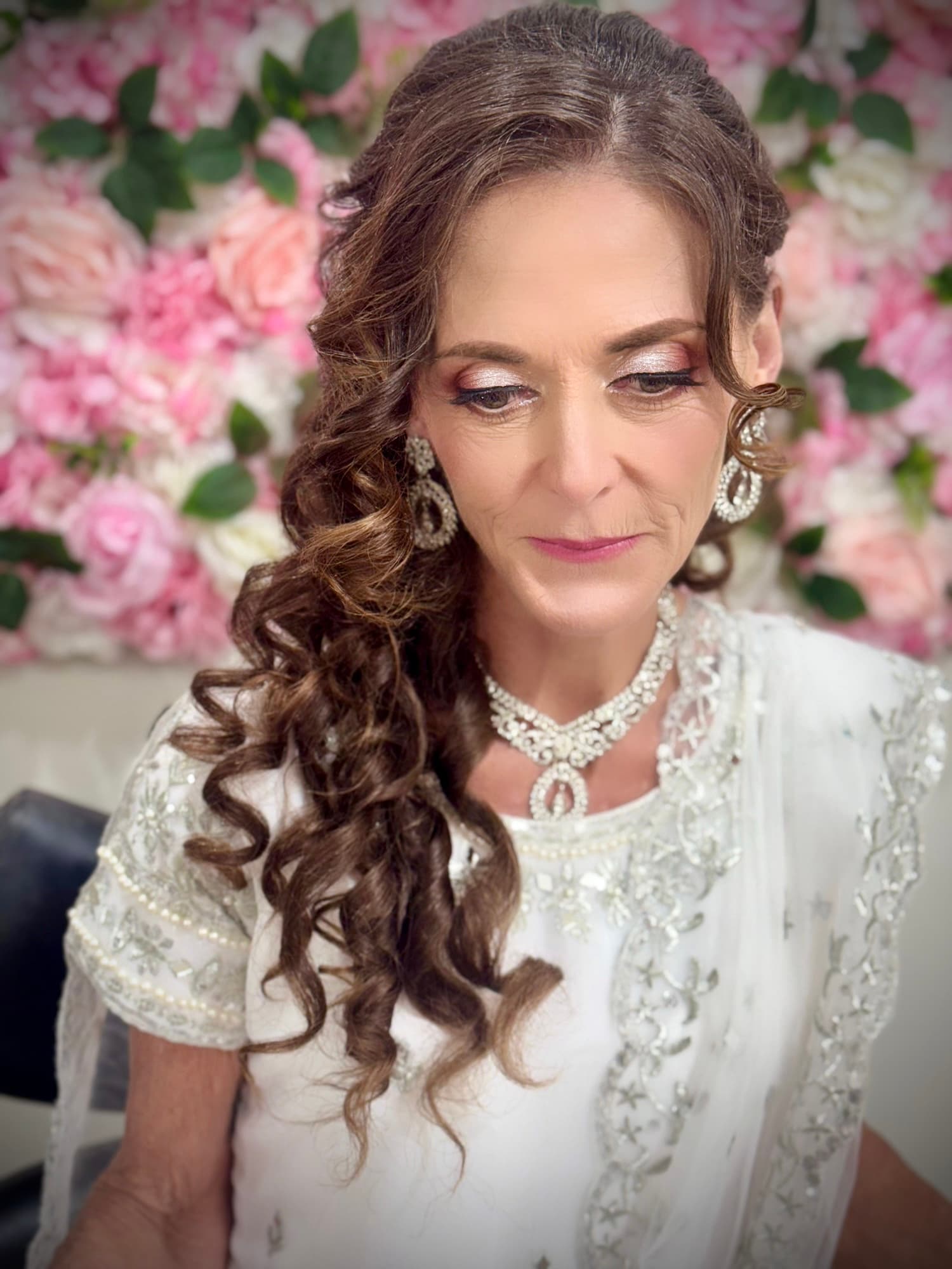 Bridal downward gaze, diamond necklace detail