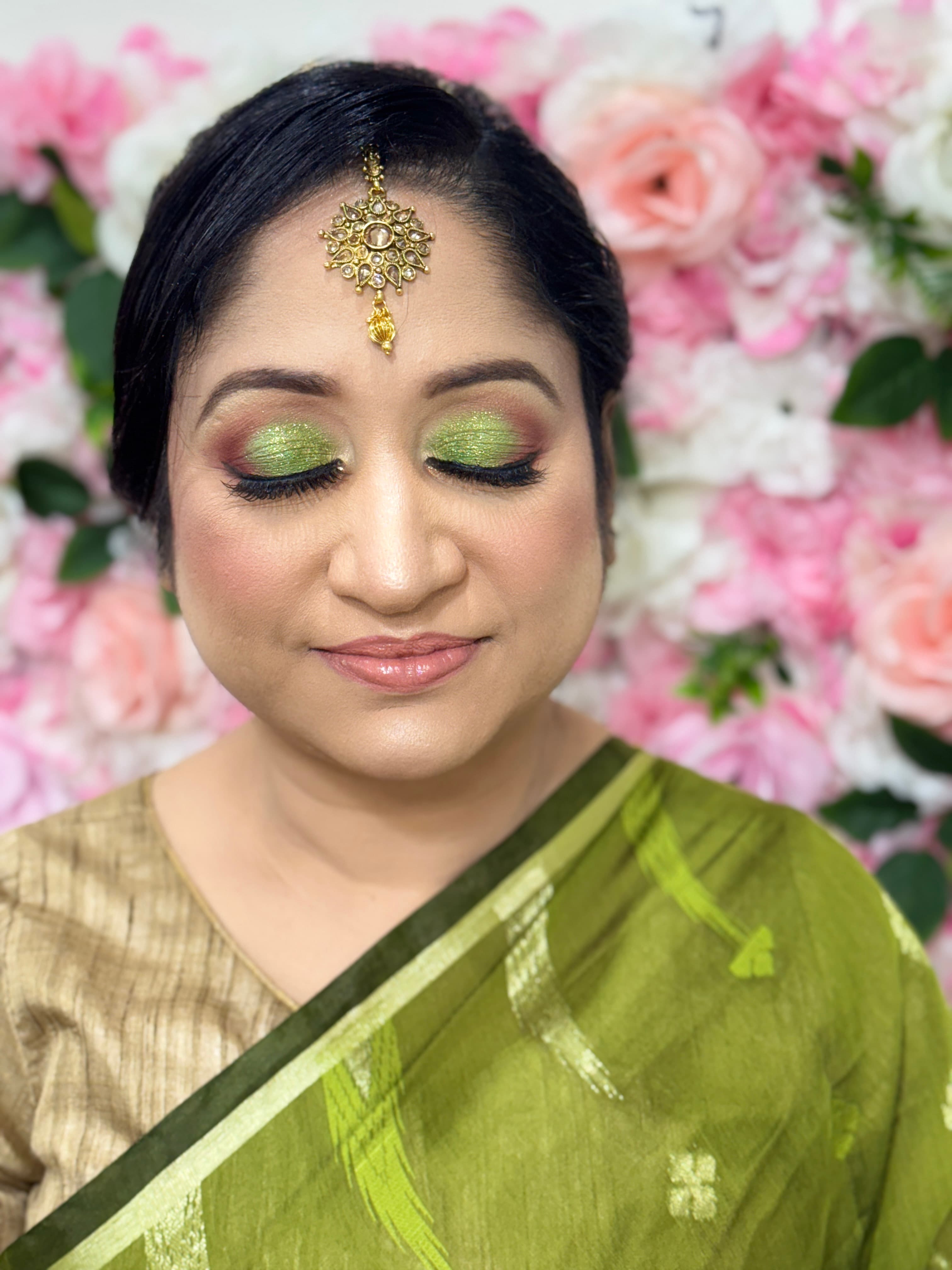 Engagement glam — sage green saree, gold jewellery