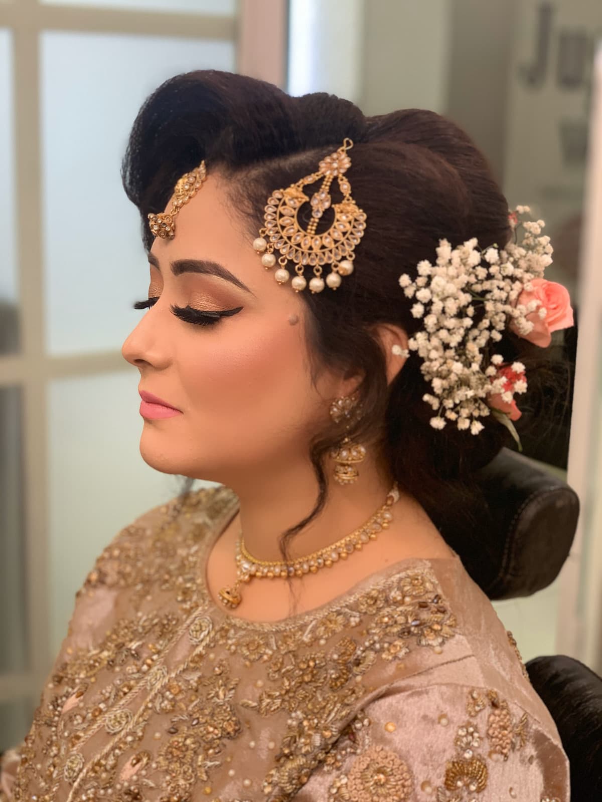 Profile glam with baby's breath hair accent
