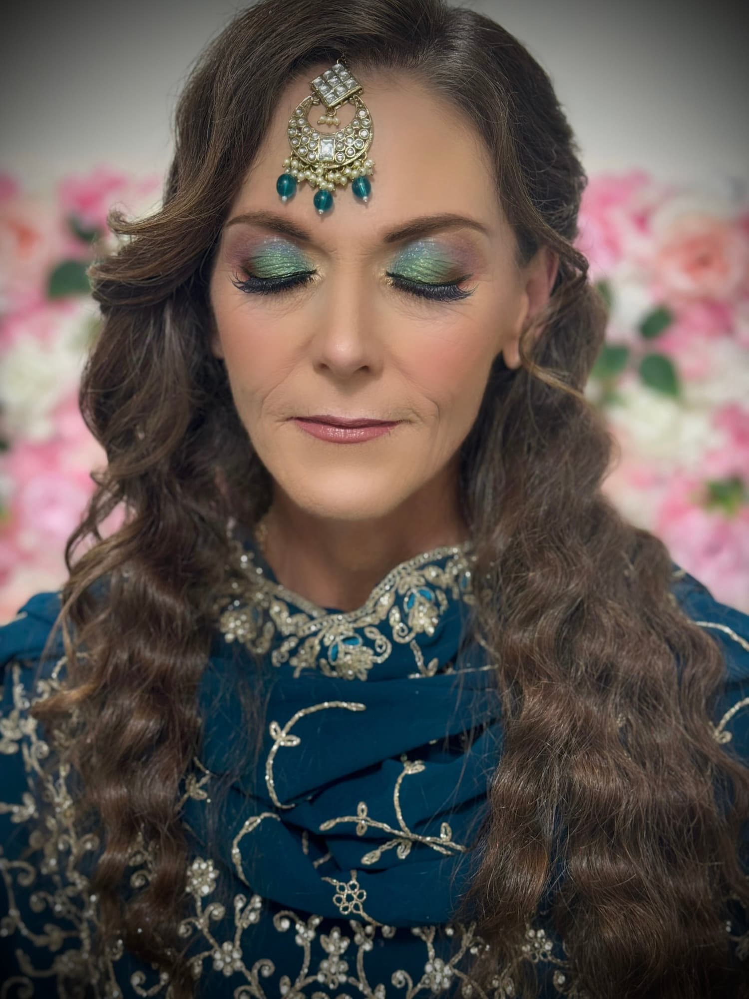 Jewel-tone green and gold eye look
